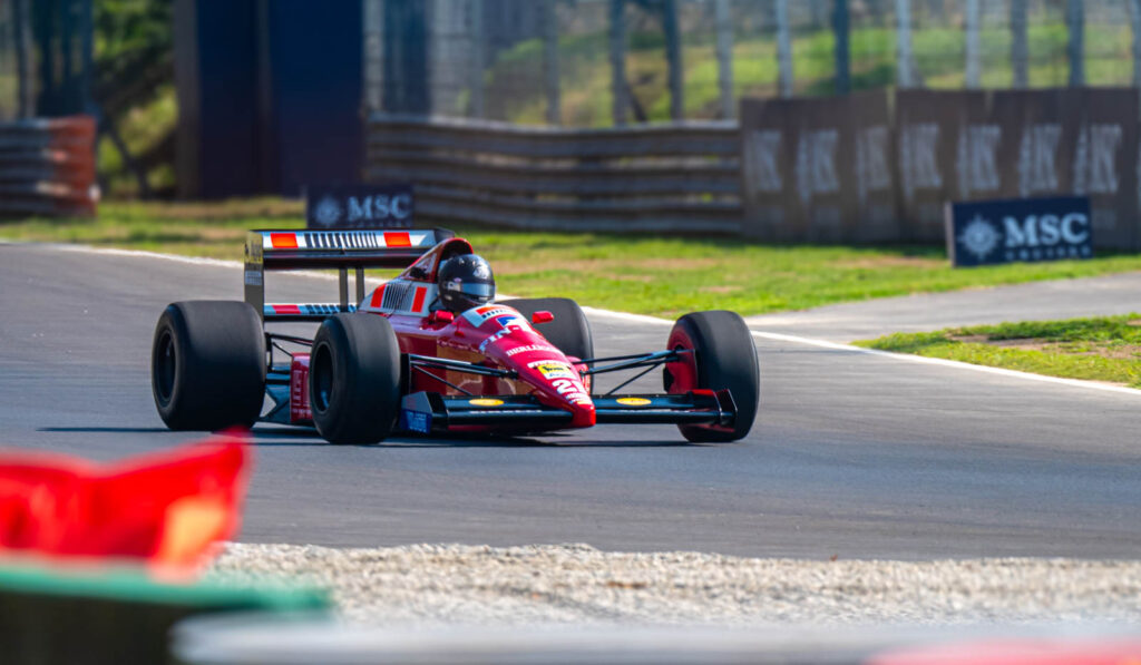 A historic Ferrari Formula One car in action at Monza, 2024